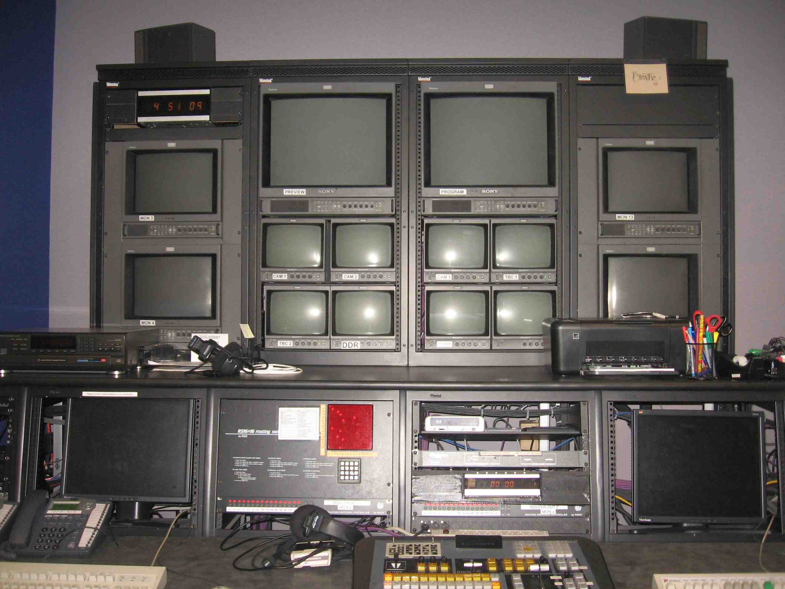 production booth, monitors for director to call the shots